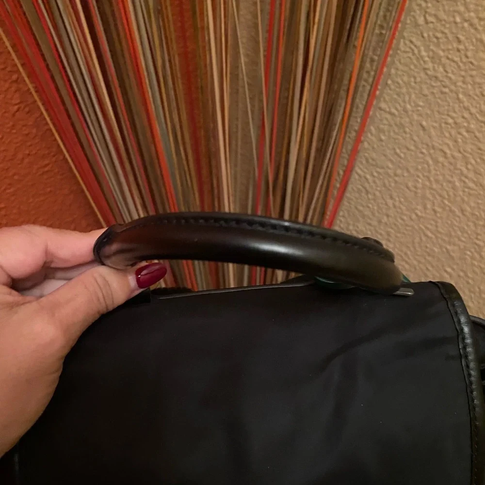 TORY BURCH- EUC Perry Black Nylon Quilted Green Interior Flap Cinched Backpack